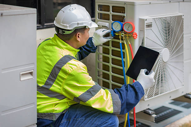 Professional Ac Installation technician working in Breedsville, MI